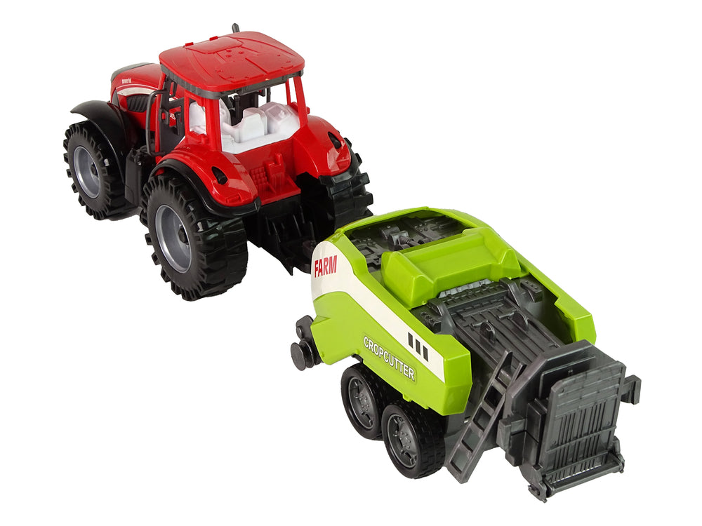 Roter Farmtraktor mit grüner Sämaschine Reibungsantrieb