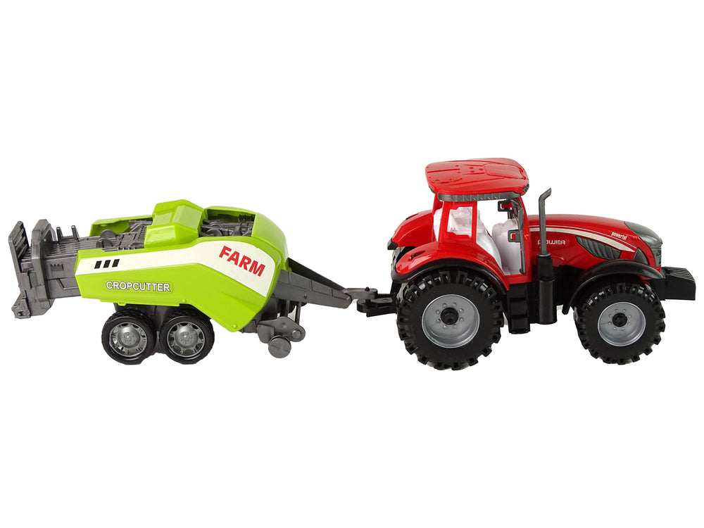 Roter Farmtraktor mit grüner Sämaschine Reibungsantrieb