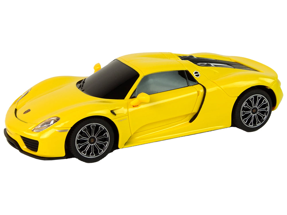 Ferngesteuertes Spielzeugauto Porsche 918 1:24 Rastar Gelb