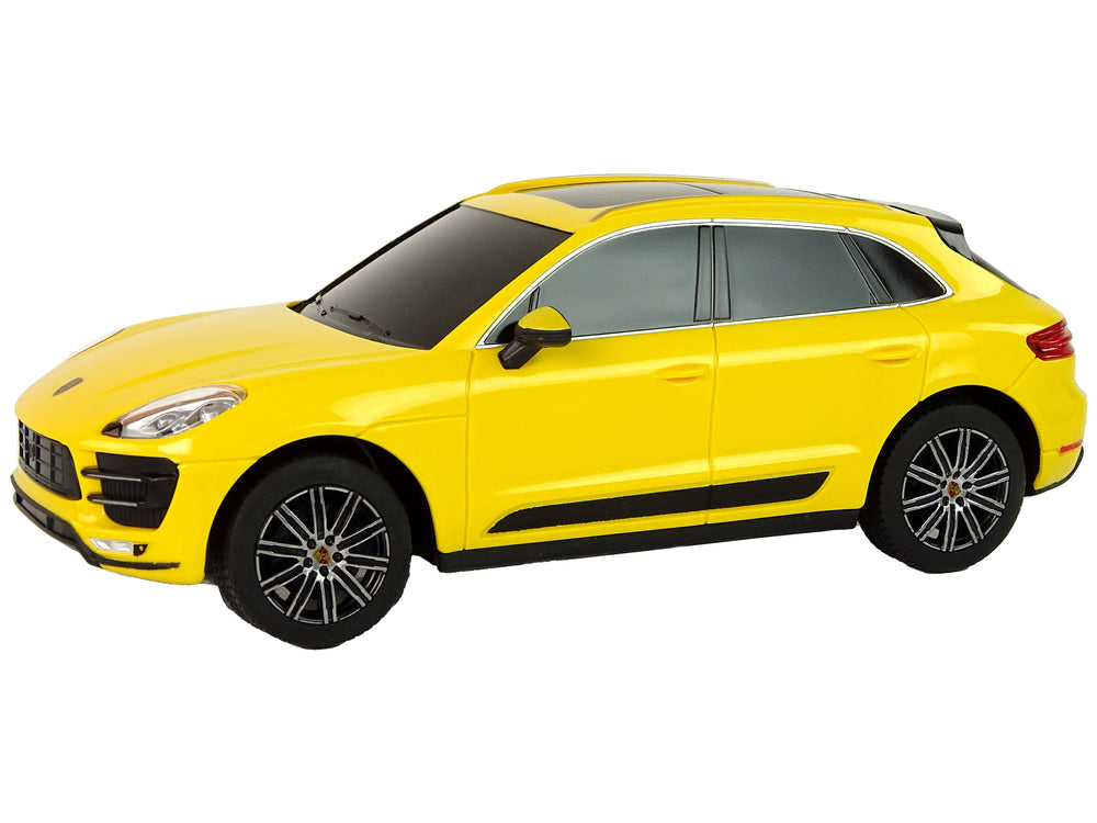 Ferngesteuertes Spielzeugauto Porsche Macan Turbo 1:24 Rastar Gelb