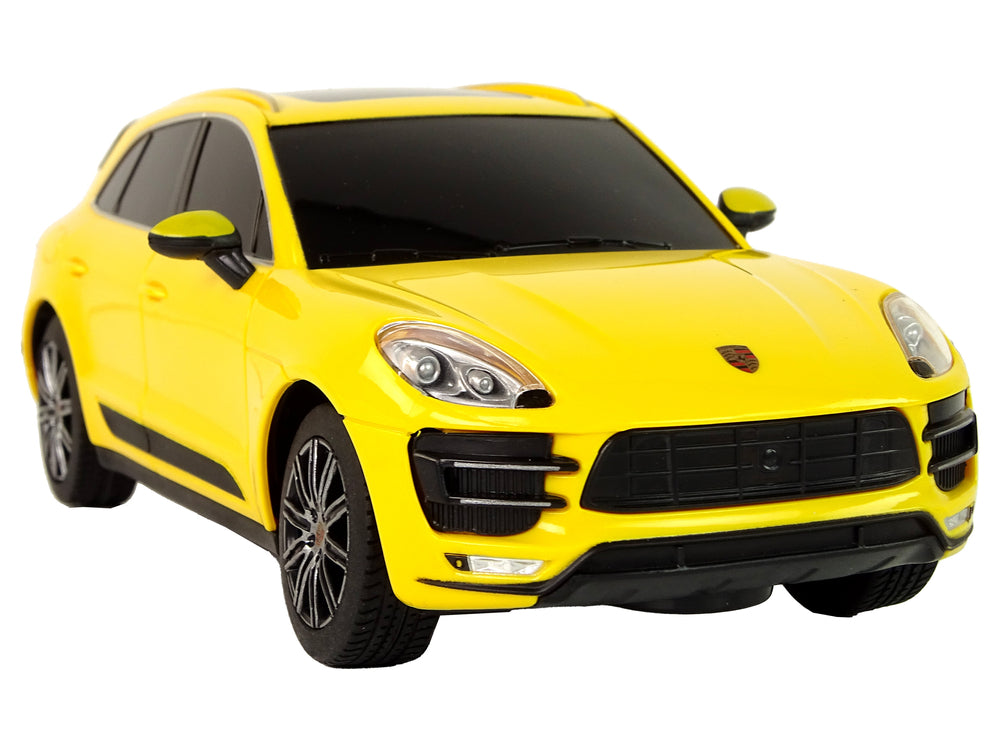 Ferngesteuertes Spielzeugauto Porsche Macan Turbo 1:24 Rastar Gelb