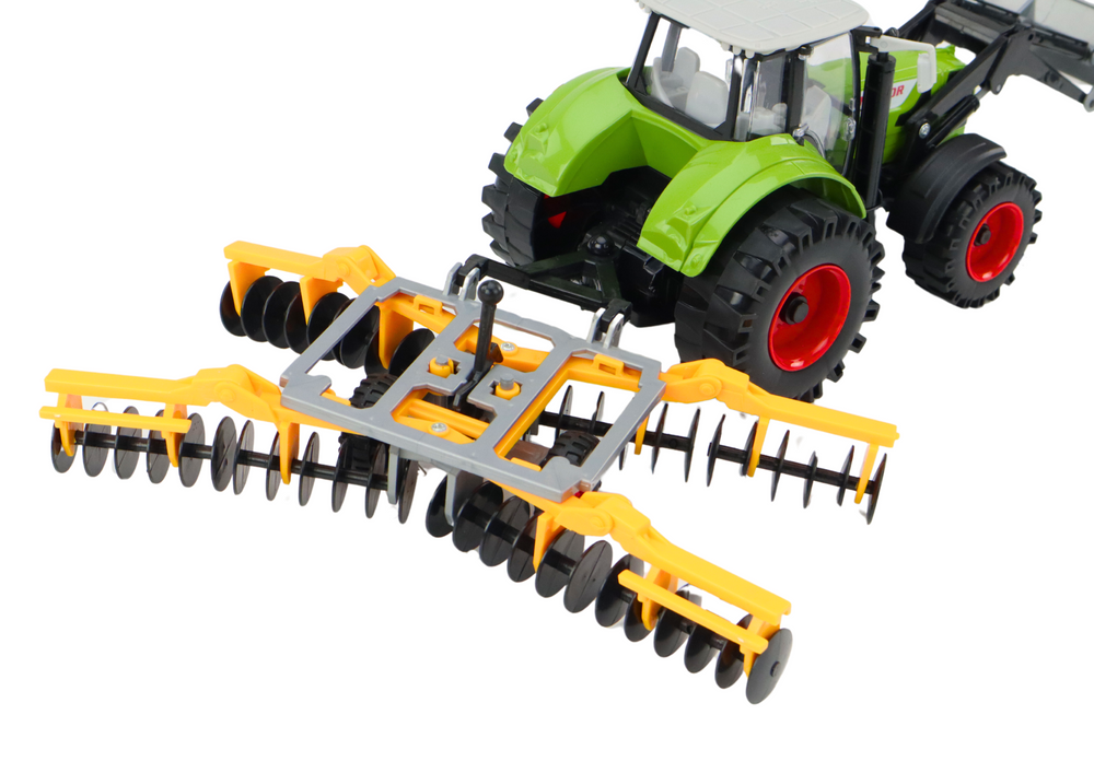 Landwirtschaftlicher Traktorbagger mit Scheibeneggen-Grünantrieb