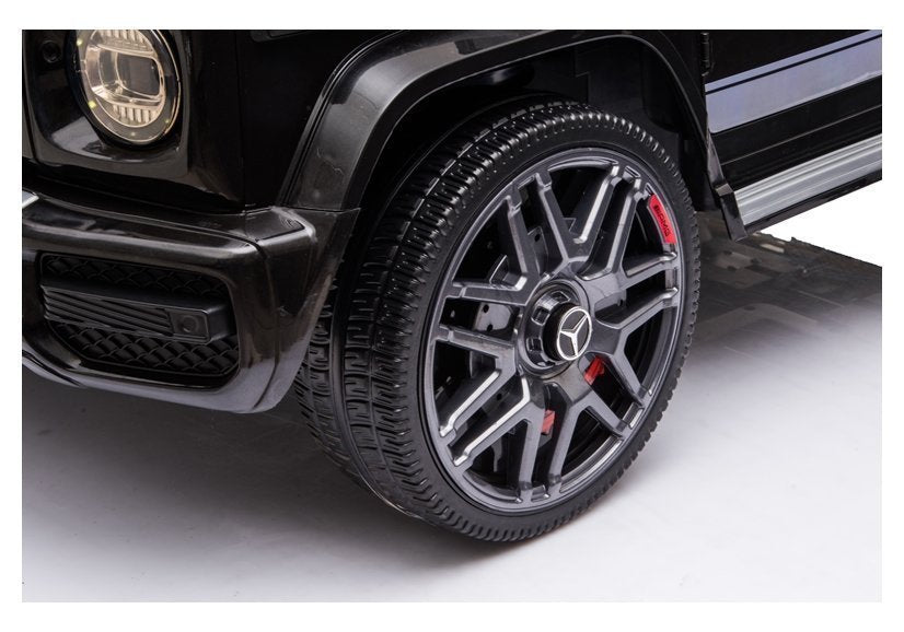 Elektro Kinderfahrzeug Mercedes G63 AMG Schwarz Lackiert Mit Ledersitz Und EVA-Reifen