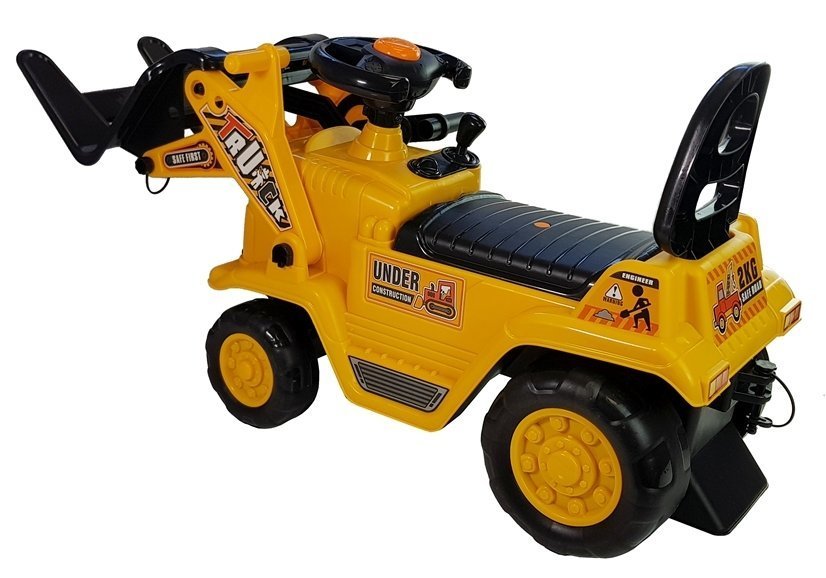 Children ride on a pushcart forklift