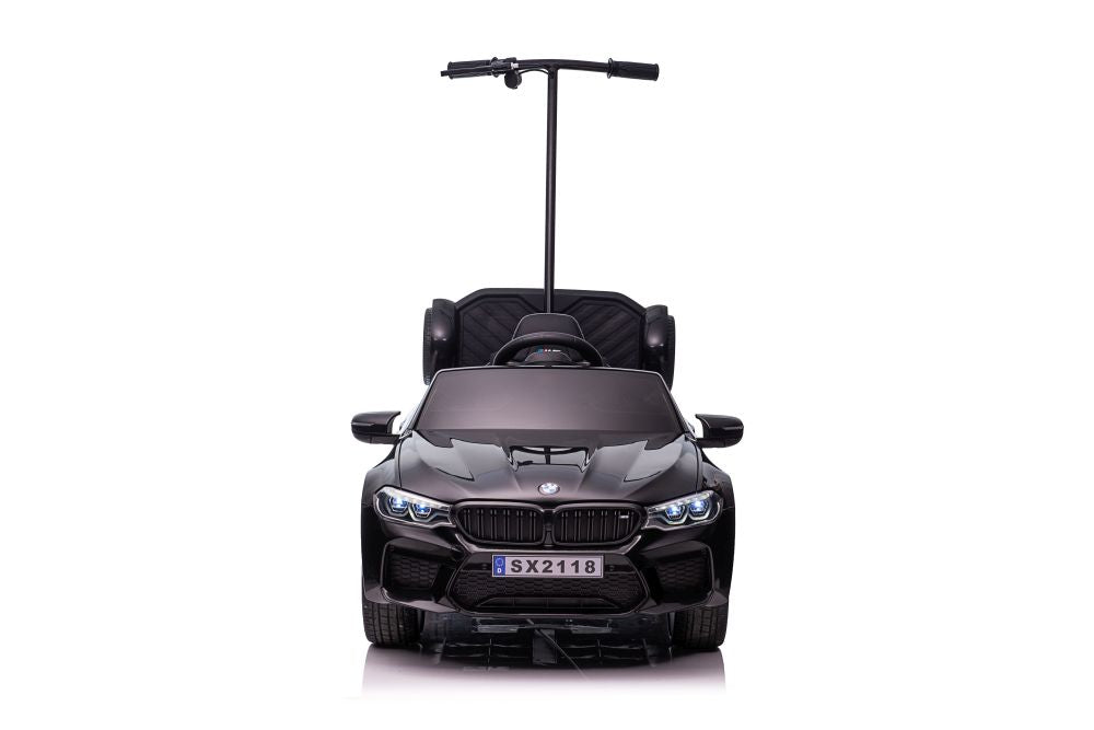 Battery-powered car BMW M5 with platform for parents, painted black