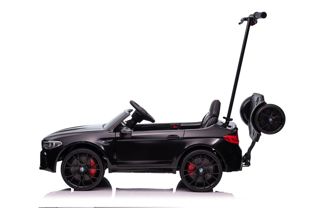 Battery-powered car BMW M5 with platform for parents, painted black