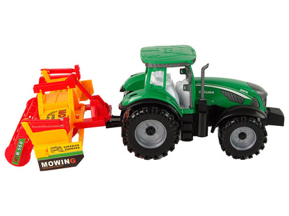 Grüner Traktor mit orangefarbenem Grubber für Kinder