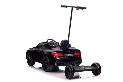 Battery-powered car BMW M5 with platform for parents, painted black